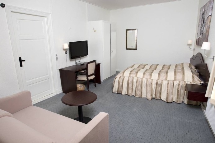 Imagen de la habitación del Hotel Gram Slotskro. Foto 12