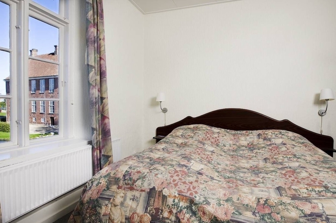 Imagen de la habitación del Hotel Gram Slotskro. Foto 14