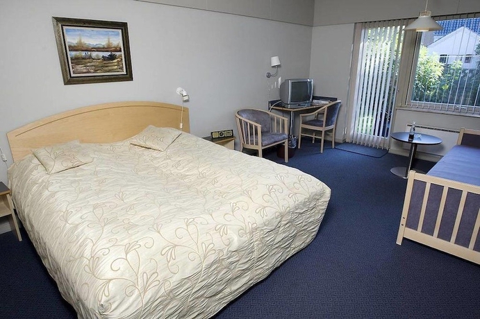 Imagen de la habitación del Hotel Gram Slotskro. Foto 16