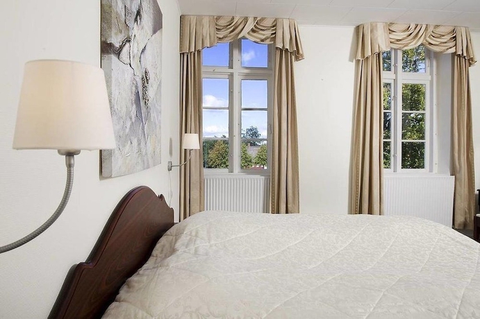 Imagen de la habitación del Hotel Gram Slotskro. Foto 19