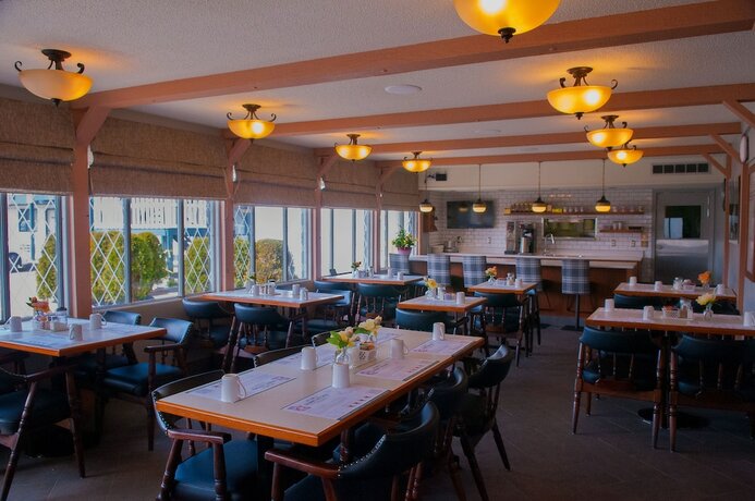 Imagen del bar/restaurante del Hotel Grama's Inn. Foto 15