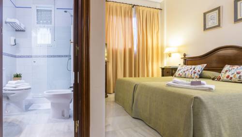 Imagen de la habitación del Hotel Gran Avenida, Coria Del Rio. Foto 4