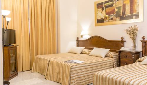 Imagen de la habitación del Hotel Gran Avenida, Coria Del Rio. Foto 12