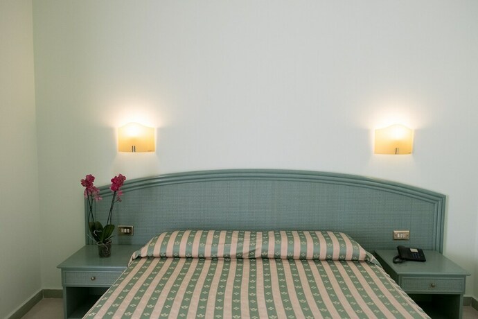 Imagen de la habitación del Hotel Gran Bretagna Boutique Hotel Ortigia. Foto 19