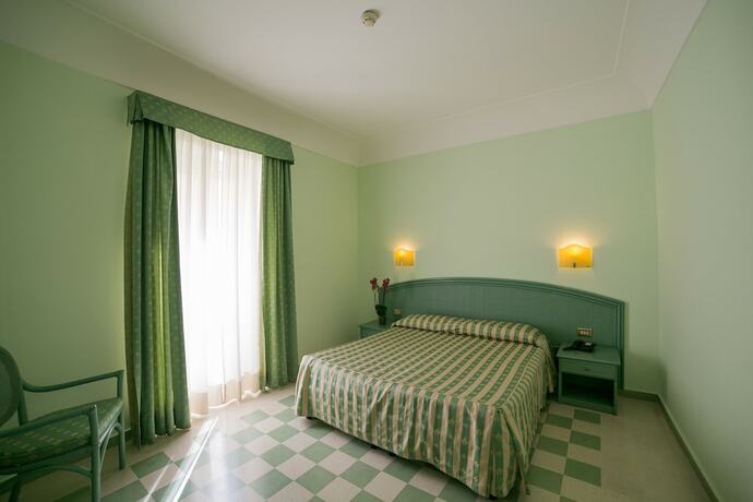 Imagen de la habitación del Hotel Gran Bretagna Boutique Hotel Ortigia. Foto 30