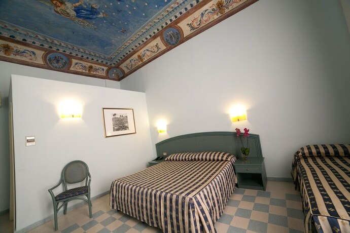 Imagen de la habitación del Hotel Gran Bretagna Boutique Hotel Ortigia. Foto 31