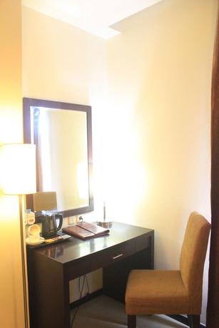 Imagen de la habitación del Hotel Gran Central Manado. Foto 10