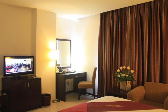 Imagen de la habitación del Hotel Gran Central Manado. Foto 12