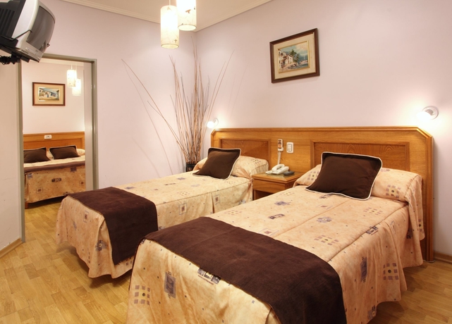 Imagen de la habitación del Hotel Gran De La Paix. Foto 10