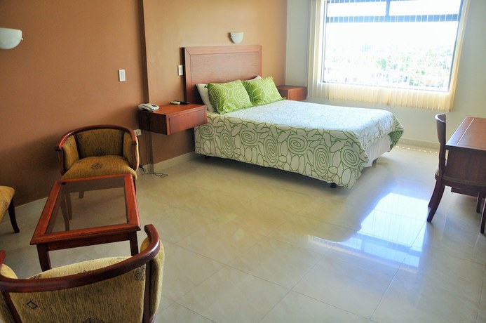 Imagen de la habitación del Hotel Gran De Lago El Coca. Foto 11