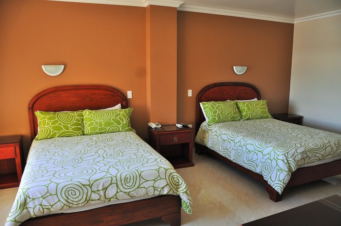 Imagen de la habitación del Hotel Gran De Lago El Coca. Foto 15