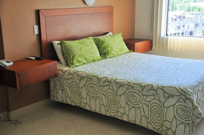 Imagen de la habitación del Hotel Gran De Lago El Coca. Foto 19