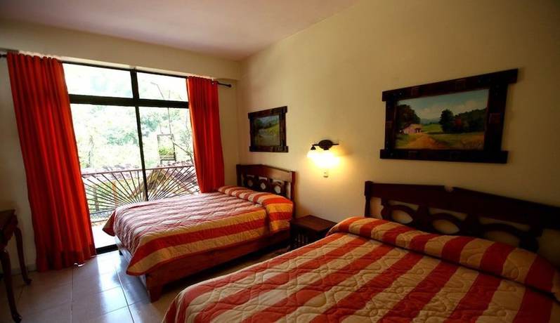 Imagen de la habitación del Hotel Gran Jimenoa. Foto 6