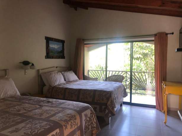 Imagen de la habitación del Hotel Gran Jimenoa. Foto 9