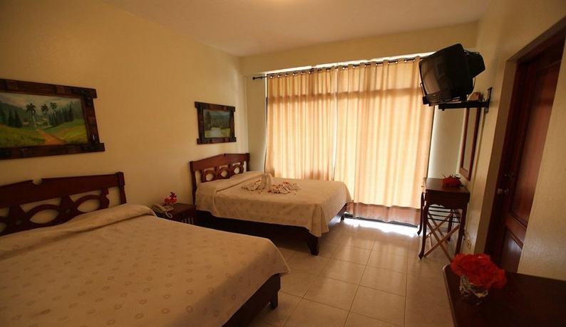 Imagen de la habitación del Hotel Gran Jimenoa. Foto 10