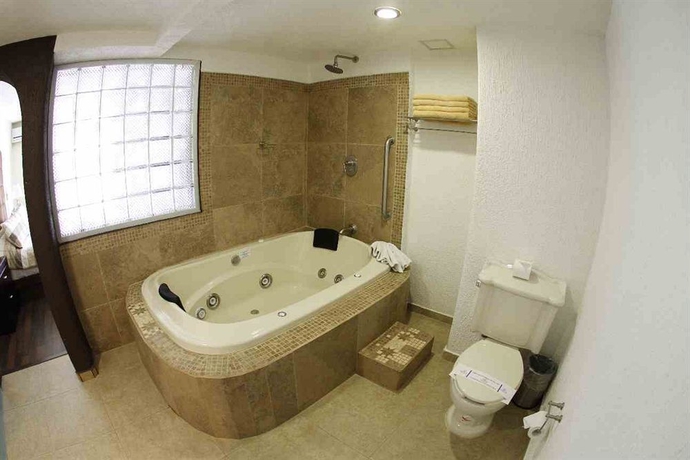 Imagen de la habitación del Hotel Gran Plaza and Convention Center. Foto 8