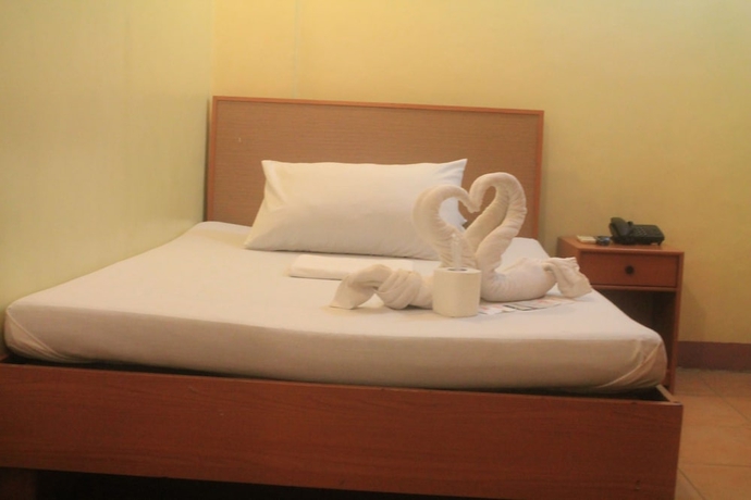 Imagen de la habitación del Hotel Gran Prix Quezon City. Foto 3