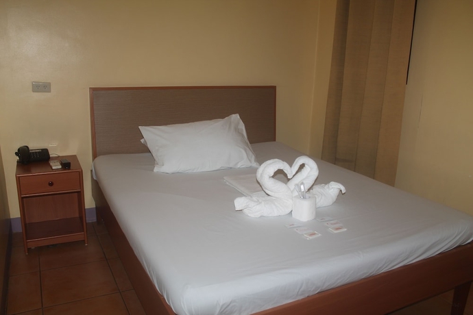 Imagen de la habitación del Hotel Gran Prix Quezon City. Foto 6