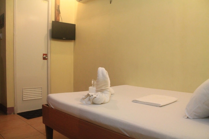 Imagen de la habitación del Hotel Gran Prix Quezon City. Foto 7