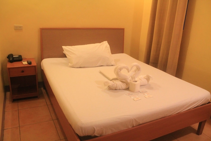 Imagen de la habitación del Hotel Gran Prix Quezon City. Foto 12