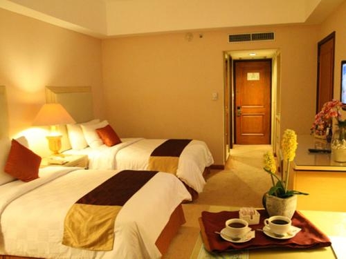 Imagen de la habitación del Hotel Gran Puri Manado. Foto 6