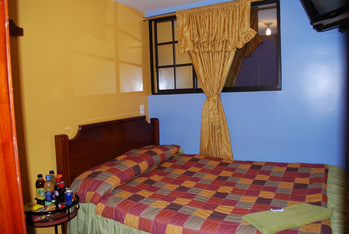 Imagen de la habitación del Hotel Gran Quitumbe. Foto 9