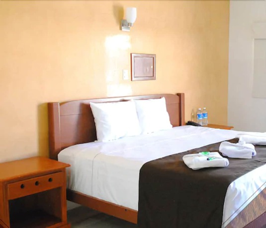 Imagen de la habitación del Hotel Gran Residencial Galerias. Foto 4