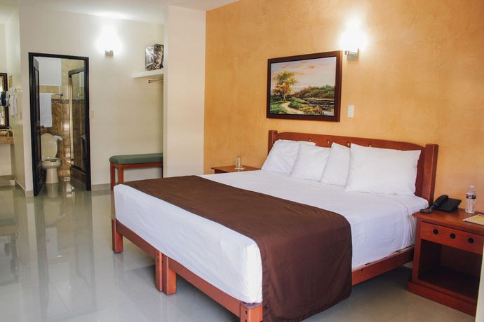 Imagen de la habitación del Hotel Gran Residencial Galerias. Foto 12