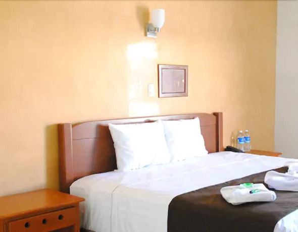 Imagen de la habitación del Hotel Gran Residencial Galerias. Foto 14
