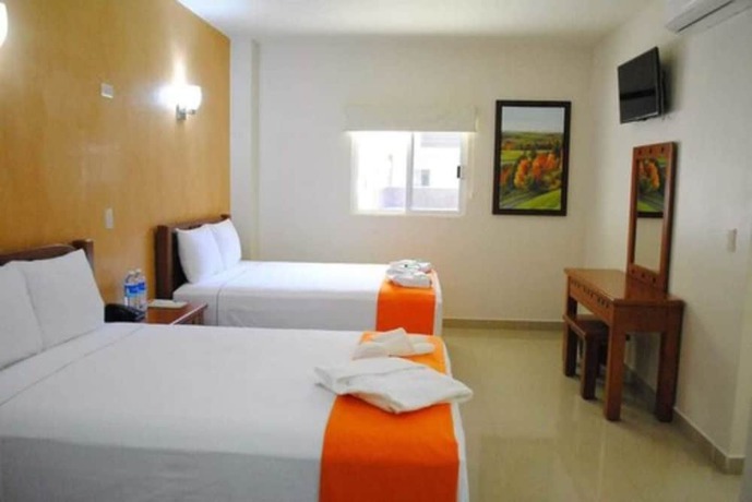 Imagen de la habitación del Hotel Gran Residencial Galerias. Foto 15