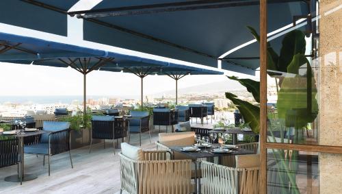 Imagen del bar/restaurante del Hotel Gran Taoro. Foto 2