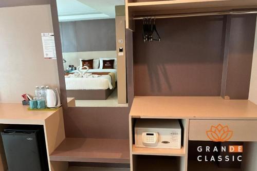 Imagen de la habitación del Hotel GranDE Classic Pattaya, Na Kluea. Foto 17