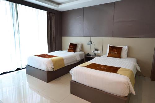 Imagen de la habitación del Hotel GranDE Classic Pattaya, Na Kluea. Foto 18