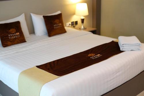 Imagen de la habitación del Hotel GranDE Classic Pattaya, Na Kluea. Foto 19