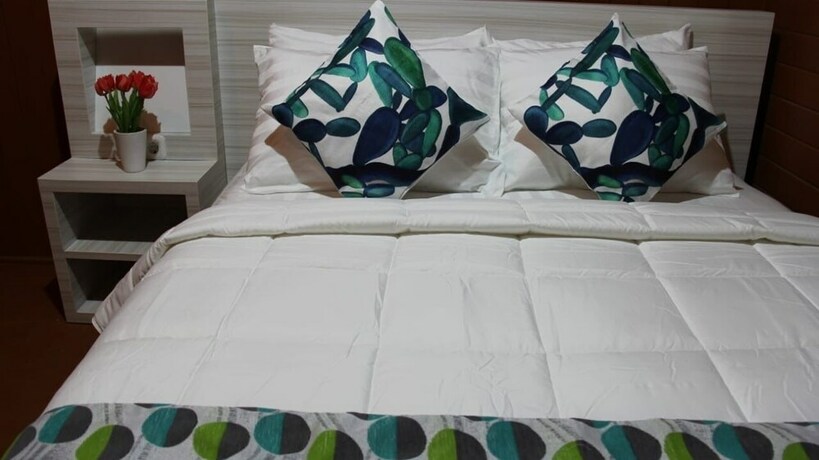 Imagen de la habitación del Hotel Granada Inn Palu. Foto 15