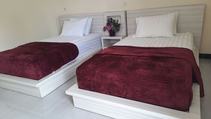 Imagen de la habitación del Hotel Granada Inn Palu. Foto 18