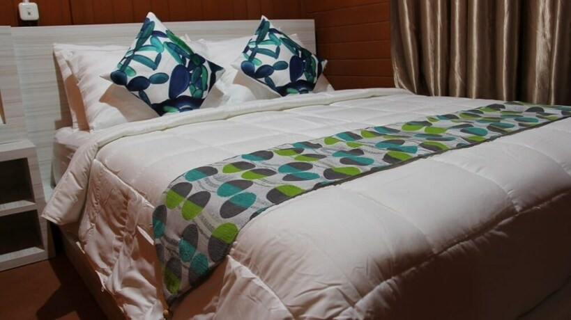 Imagen de la habitación del Hotel Granada Inn Palu. Foto 19