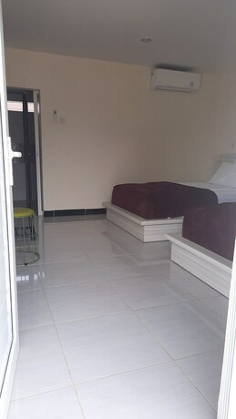 Imagen de la habitación del Hotel Granada Inn Palu. Foto 24