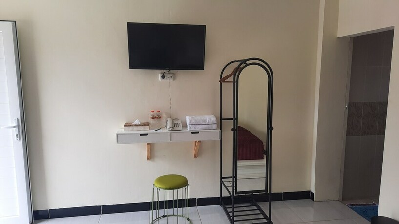 Imagen de la habitación del Hotel Granada Inn Palu. Foto 27