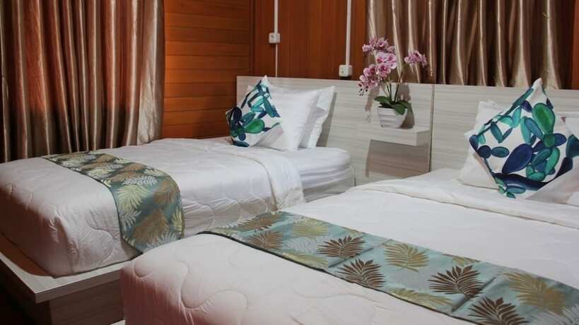 Imagen de la habitación del Hotel Granada Inn Palu. Foto 28