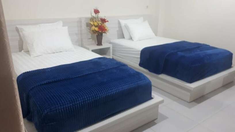 Imagen de la habitación del Hotel Granada Inn Palu. Foto 29