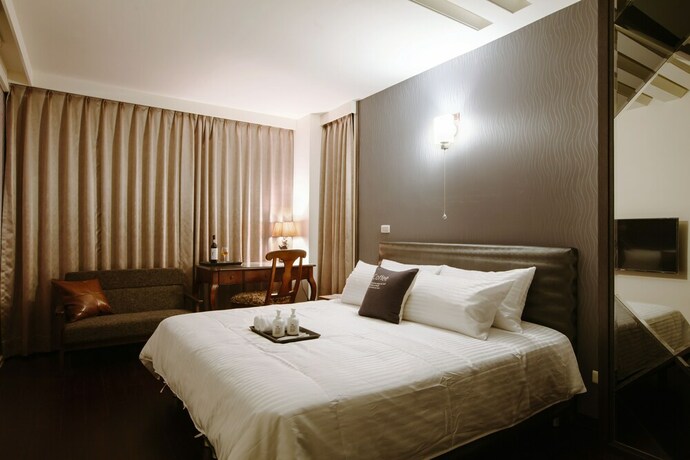 Imagen de la habitación del Hotel Grand Allevia Villa. Foto 19