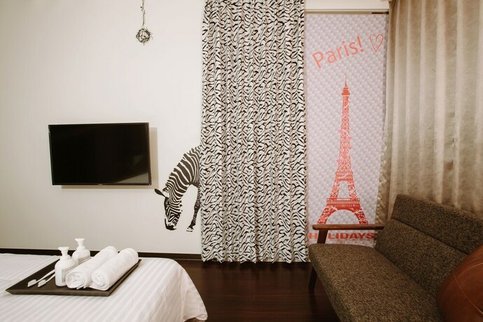 Imagen de la habitación del Hotel Grand Allevia Villa. Foto 31