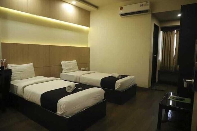 Imagen de la habitación del Hotel Grand Ambience. Foto 2