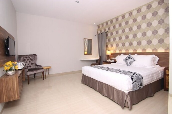 Imagen de la habitación del Hotel Grand Amira. Foto 19