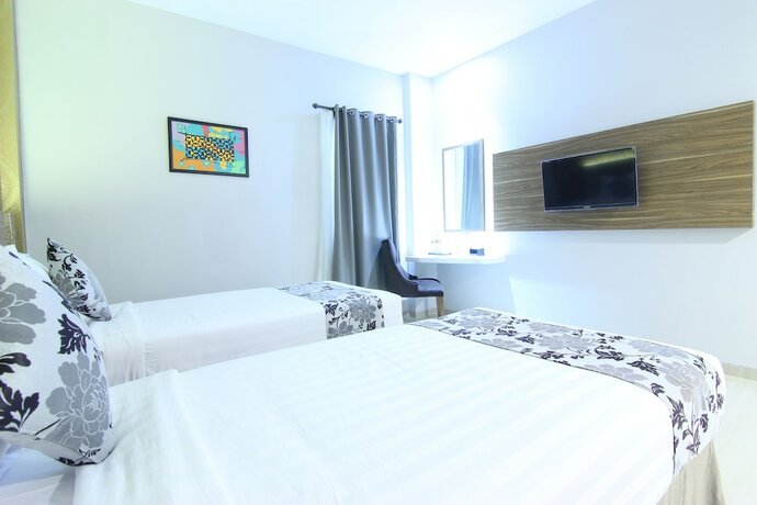 Imagen de la habitación del Hotel Grand Amira. Foto 22