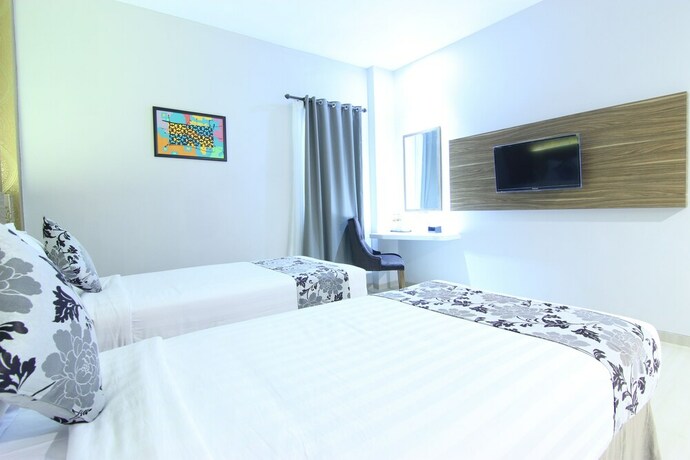Imagen de la habitación del Hotel Grand Amira. Foto 26