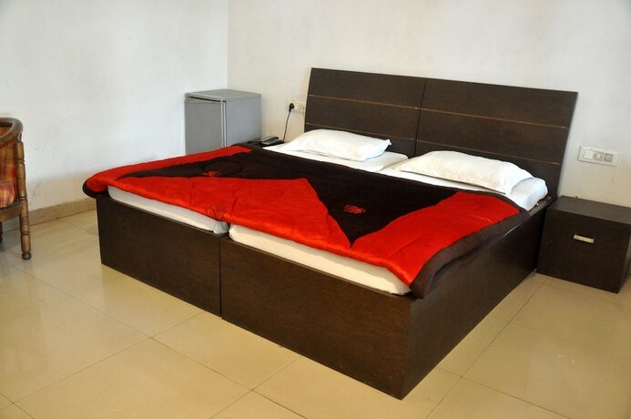 Imagen de la habitación del Hotel Grand, Amritsar. Foto 19