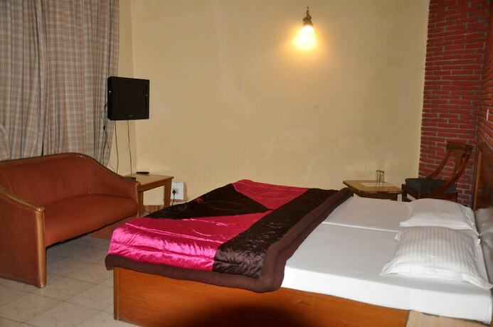 Imagen de la habitación del Hotel Grand, Amritsar. Foto 21