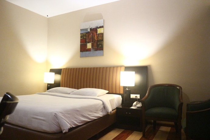 Imagen de la habitación del Hotel Grand Anugerah. Foto 9